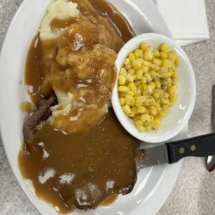 Hamburger steak with mashed potatoes and corn