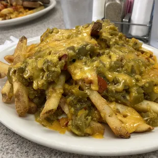 Roadrunner special ( smothered burger plate), is piled high!