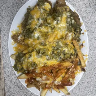 Chicken tenders smothered in Green Chile &amp; fry's smothered in red Chile