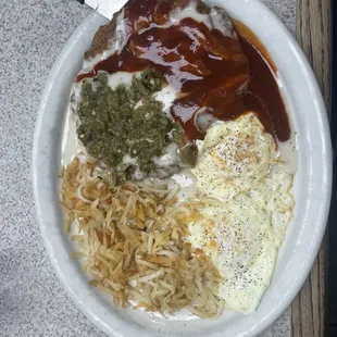 Chicken, fried steak and eggs with red and green Chile