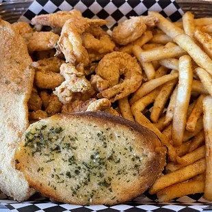 a basket of fries and a sandwich