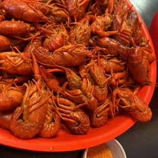 a plate of cooked crawfish