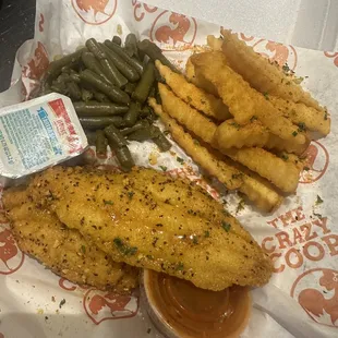 2pc Lemon Pepper Wet catfish dinner with season fries and green beans.