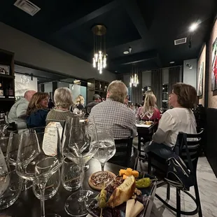 Their first wine tasting! South African wines on deck.