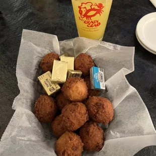 a bowl of fried food and a drink