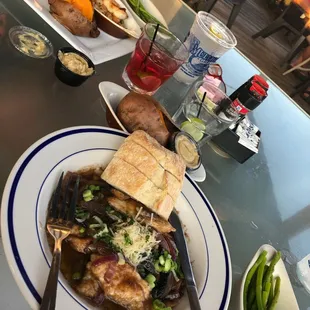 Chicken marsala with asparagus. And that&apos;s pan seared scallops and sweet potato to the left.