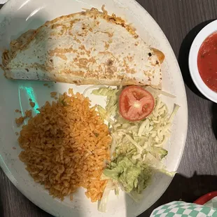 Chicken quesadilla - filled with beans, chicken, and cheese. Mmmmm mmmm goood.