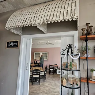 a dining room with a table and chairs