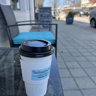 a cup of coffee on a table