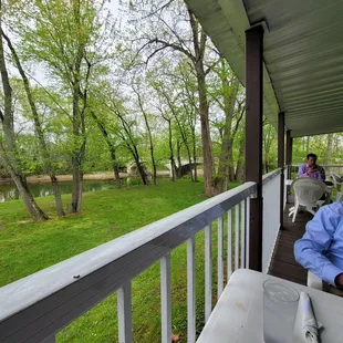 a man sitting on a porch