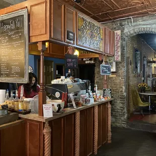 a woman standing at the counter