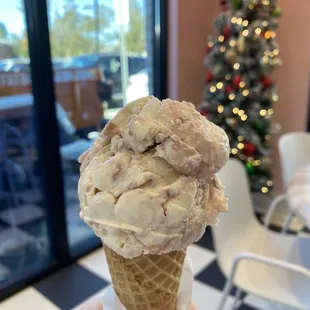 Scoop of Sufganiyot in a sugar cone