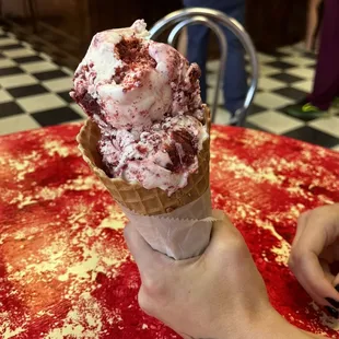 Double scoop of Red Velvet in a waffle cone