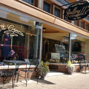 There is about four tables out front on the street to enjoy your morning coffee and breakfast.