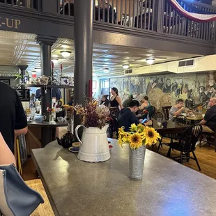 The Creperie is in the back of the gallery. There is also seating upstairs.