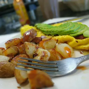 Morning omelette with sauteed potatoes. Light and hearty.