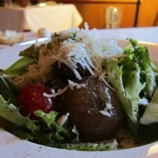 Mixed field green salad with olives, cucumbers, sweet red onion, grape tomatoes &amp; vinaigrette