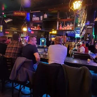 people sitting at the bar