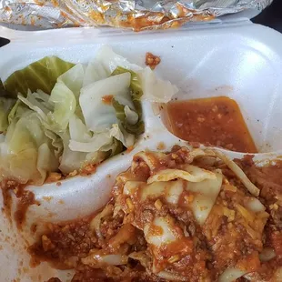Tastes just like it looks...a hot mess. Small serving of cabbage.