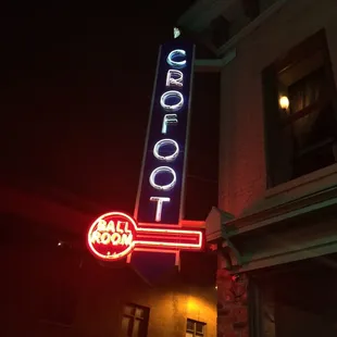 the neon sign for the restaurant