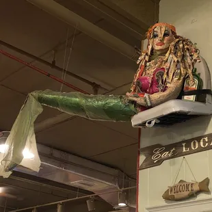 a statue of a mermaid