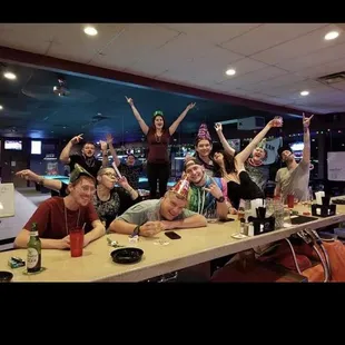 a group of people sitting at a table