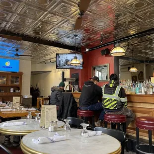 people sitting at the bar