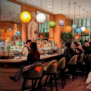 people sitting at the bar