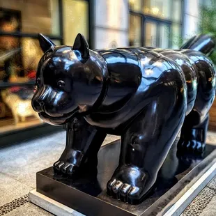 a statue of a black cat