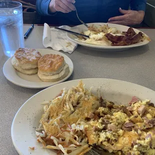 3 meat scramble and 2 eggs w/ bacon and biscuits.