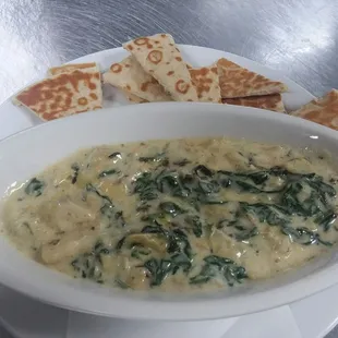 Spinach and artichoke dip with pita bread
