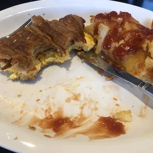 half-eaten Breakfast Croissant