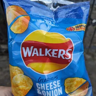 a bag of walkers cheesy onion chips