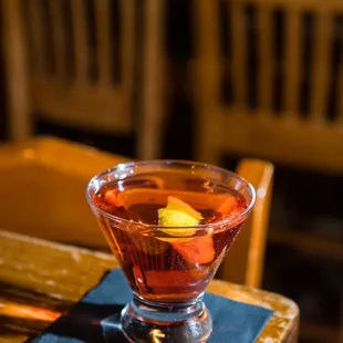 a glass of tea on a table