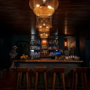 a man standing at the bar