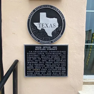 Historical marker on the building.