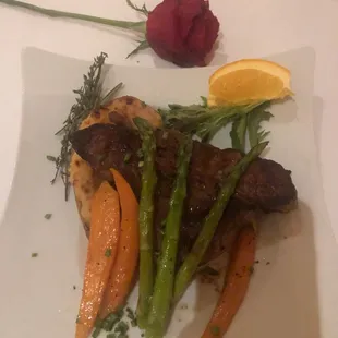 a plate of meat and vegetables