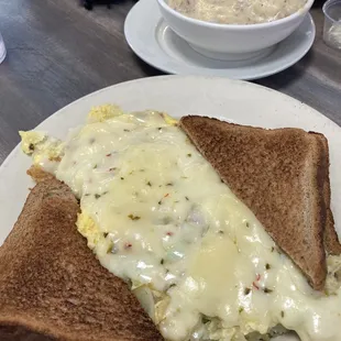 German fries with pepper jack cheese &amp; half full of gravy and biscuits