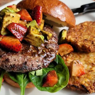 Strawberry avocado Angus burger with potato pancakes