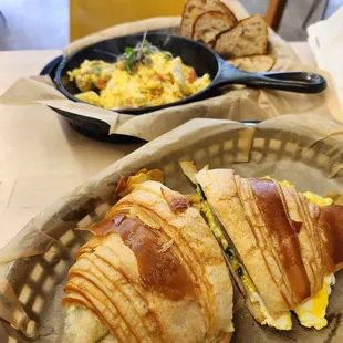 Custom order: Croissant with spinach, eggs, &amp; cheese.  Husband got the bakers scramble, which came out nice and steamy!