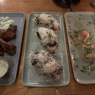 Peruvian wings Mushroom crostini  Hamachi crudo