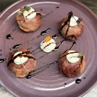 Gougère with ricotta , prosciutto and balsamic glaze