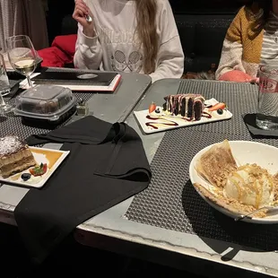 Flourless chocolate cake, tiramisu, and whipped fig, cheese and nuts crepes with gelato.