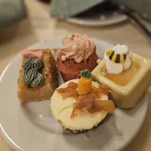 Desserts (some not pictured). The honey bee flan was nice and wasn't overly sweet. The pink strawberry mini cake was our favorite.