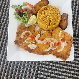 Grilled Fish Fillet, yellow rice, sweet plantain and salad