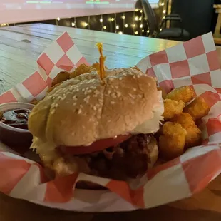 a burger and fries in a basket