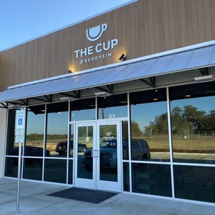 Entrance of The Cup @ Bergheim off Hwy 46 behind the new Exxon facing Voss Parkway.