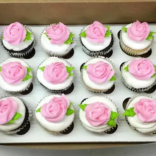 a dozen cupcakes in a box