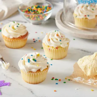 cupcakes with frosting and sprinkles