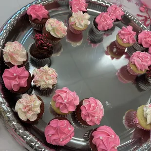 Pink gender reveal assorted mini cupcakes